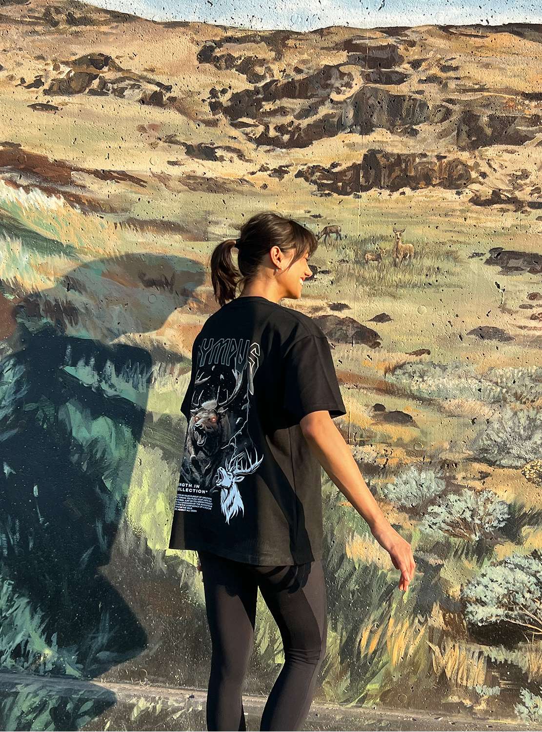 Black OLYMPUS Elk heavyweight graphic tee worn by model