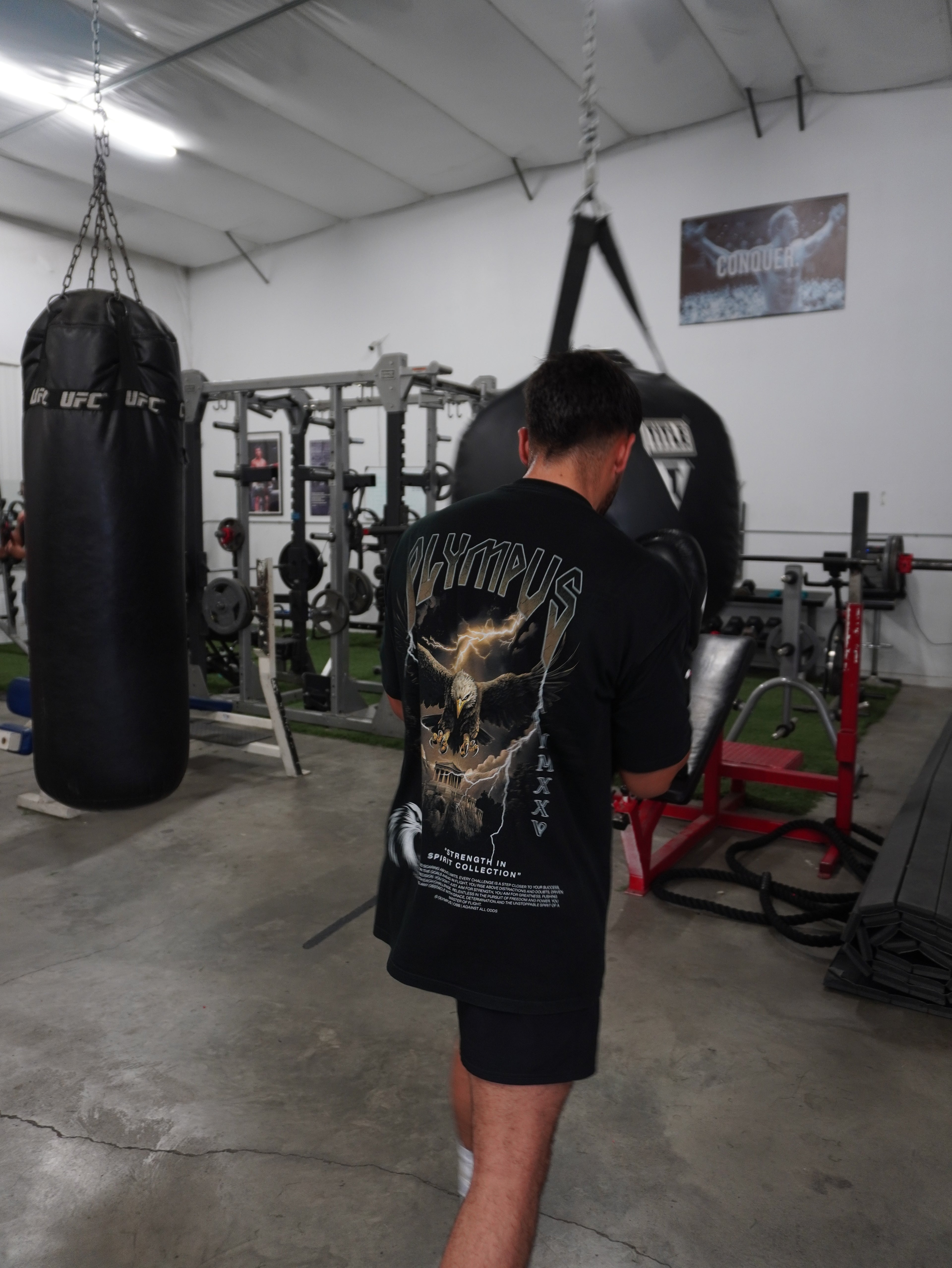 Black OLYMPUS Aetos Eagle Heavyweight Graphic Tee worn by model